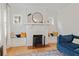 Living room with white brick fireplace and built-in seating at 2286 Oakview Ne Rd, Atlanta, GA 30317