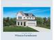 Exterior of the Wieuca Farmhouse, a two-story home with white siding and a gray roof at 5055 Baywood Ln, Woodstock, GA 30188
