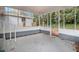 Spacious screened porch overlooks a wooded backyard at 2435 Wood Valley Dr, Atlanta, GA 30344