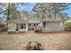 Spacious backyard with a screened porch and deck at 2435 Wood Valley Dr, Atlanta, GA 30344