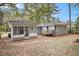 View of house exterior, showcasing screened porch and deck at 2435 Wood Valley Dr, Atlanta, GA 30344