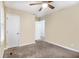 Bedroom with ceiling fan and access to hallway at 3449 Misty Valley Rd, Decatur, GA 30032