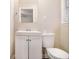 Simple bathroom with white vanity and toilet at 3449 Misty Valley Rd, Decatur, GA 30032
