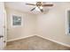 Spacious bedroom with ceiling fan and neutral carpeting at 3449 Misty Valley Rd, Decatur, GA 30032