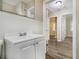Clean bathroom with white vanity and tile at 3449 Misty Valley Rd, Decatur, GA 30032