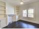 Spacious living room with built-in shelving and fireplace at 960 Taft Ne Ave # 6, Atlanta, GA 30309