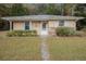 Ranch house exterior with stone accents and landscaping at 520 Mcdonough Rd, Hampton, GA 30228