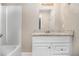 Bathroom features granite countertop and white vanity at 1870 S Columbia Pl, Decatur, GA 30032