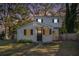 Two-story house with gray siding, updated windows, and a small front yard at 1870 S Columbia Pl, Decatur, GA 30032