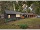 Modern dark brown house with updated landscaping at 1973 Glendale Dr, Decatur, GA 30032