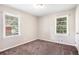 Spacious bedroom with neutral decor and carpet flooring at 2604 Harmony Way, Atlanta, GA 30344