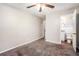 Bedroom with carpet flooring and access to the bathroom at 2604 Harmony Way, Atlanta, GA 30344