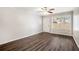 Bright living room featuring hardwood floors and a ceiling fan at 2604 Harmony Way, Atlanta, GA 30344