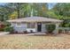 Charming ranch home with gray siding and a black door at 2604 Harmony Way, Atlanta, GA 30344