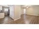 Open concept kitchen and living area with vinyl plank flooring at 2910 Delowe Dr, Atlanta, GA 30344