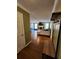 Welcoming entryway with bamboo flooring leading to a living room with a fireplace at 6340 Koweta Rd, Fairburn, GA 30213