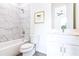 Clean bathroom with marble shower and white vanity at 1641 Mcnaught Dr # 35, Atlanta, GA 30317