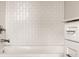 Bathroom with white subway tile and a white vanity at 1641 Mcnaught Dr # 35, Atlanta, GA 30317