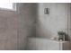 Shower with gray tile surround and built-in bench at 1641 Mcnaught Dr # 35, Atlanta, GA 30317