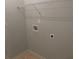 Laundry closet with shelving and hookups for washer and dryer at 6511 Grey Fox Way, Riverdale, GA 30296