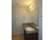 Bathroom with vanity sink, mirror, and tile floor at 6511 Grey Fox Way, Riverdale, GA 30296