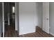 Spacious bedroom with wood floors, neutral walls and two closets at 6511 Grey Fox Way, Riverdale, GA 30296