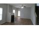 Living room with fireplace and hardwood floors at 6511 Grey Fox Way, Riverdale, GA 30296