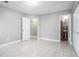 Spacious bedroom with tile flooring, ensuite bathroom, and ample natural light at 96 Sir Scott Ct, Lawrenceville, GA 30044