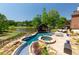 Luxury pool with spa and outdoor kitchen, perfect for entertaining at 1617 Fernstone Nw Dr, Acworth, GA 30101