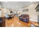 Bright dining area with hardwood floors and view into the kitchen at 1617 Fernstone Nw Dr, Acworth, GA 30101