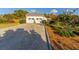 Long driveway leading to a spacious two-car garage at 2292 Acworth Due West Nw Rd, Acworth, GA 30101