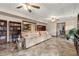 Open concept basement living area with built-in shelves at 2292 Acworth Due West Nw Rd, Acworth, GA 30101