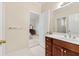 Bathroom with vanity, single sink, and access to bedroom and hallway at 2292 Acworth Due West Nw Rd, Acworth, GA 30101
