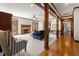 Living room with fireplace, hardwood floors, and views to other rooms at 2292 Acworth Due West Nw Rd, Acworth, GA 30101
