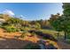 Landscaped backyard with mature trees and a tranquil atmosphere at 2292 Acworth Due West Nw Rd, Acworth, GA 30101