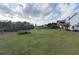 Large backyard with trampoline, and views of the property at 2292 Acworth Due West Nw Rd, Acworth, GA 30101
