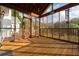 Bright and airy screened porch with wooden floors and a view at 2292 Acworth Due West Nw Rd, Acworth, GA 30101
