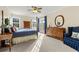 Spacious bedroom with hardwood floors, a dresser and access to a private deck at 2292 Acworth Due West Nw Rd, Acworth, GA 30101