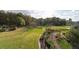 Expansive property with lush green grass and mature trees at 2292 Acworth Due West Nw Rd, Acworth, GA 30101