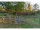 Pasture with wooden fence and gate, near wooded area at 2292 Acworth Due West Nw Rd, Acworth, GA 30101