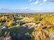Aerial view of home on large lot with scenic autumn landscape at 2292 Acworth Due West Nw Rd, Acworth, GA 30101