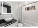 Modern bathroom with a sleek sink and bathtub at 780 Crest Valley Dr, Atlanta, GA 30327