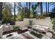 Outdoor deck space featuring comfortable seating and lush greenery at 780 Crest Valley Dr, Atlanta, GA 30327