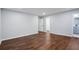 Spacious bedroom with wood-look floors and large closet at 1825 Niskey Lake Rd, Atlanta, GA 30331