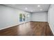 Living area with hardwood floors, fireplace and sliding glass doors at 1825 Niskey Lake Rd, Atlanta, GA 30331