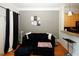 Stylish living room with hardwood floors and a sectional sofa at 799 Hammond Dr # 116, Atlanta, GA 30328