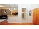 Open concept kitchen with granite countertops and wood cabinets at 799 Hammond Dr # 116, Atlanta, GA 30328