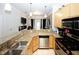 Updated kitchen with granite countertops and stainless steel appliances at 799 Hammond Dr # 116, Atlanta, GA 30328