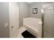 Clean bathroom with tub and shower, tile surround, and neutral colors at 799 Hammond Dr # 116, Atlanta, GA 30328