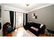 Relaxing living room with hardwood floors and access to balcony at 799 Hammond Dr # 116, Atlanta, GA 30328